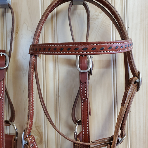 Custom bridal leather headstall, Breastcollar, and 8-foot reins with black kangaroo buck stitch.