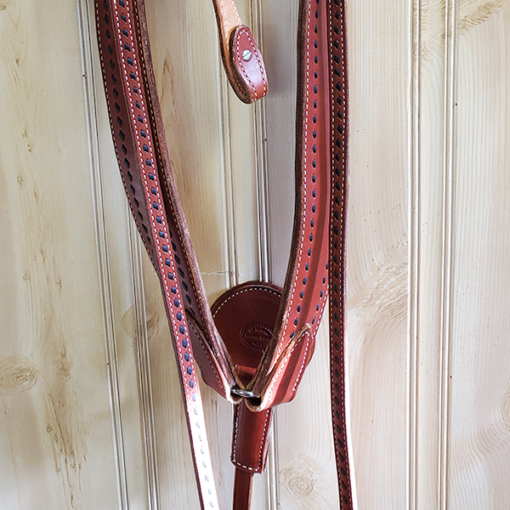 Custom bridal leather headstall, Breastcollar, and 8-foot reins with black kangaroo buck stitch.